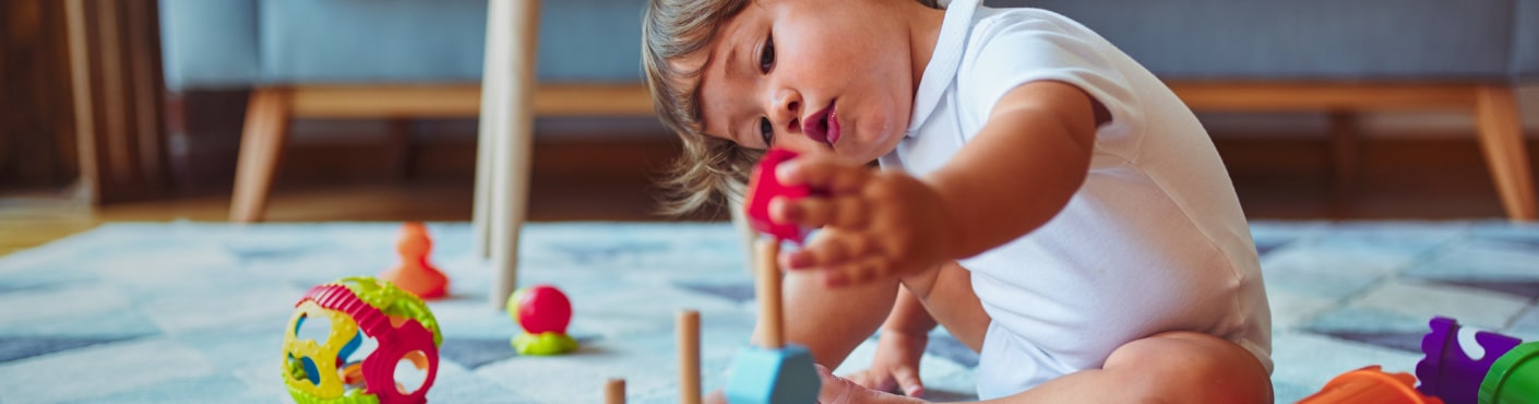 Baby playing with toys